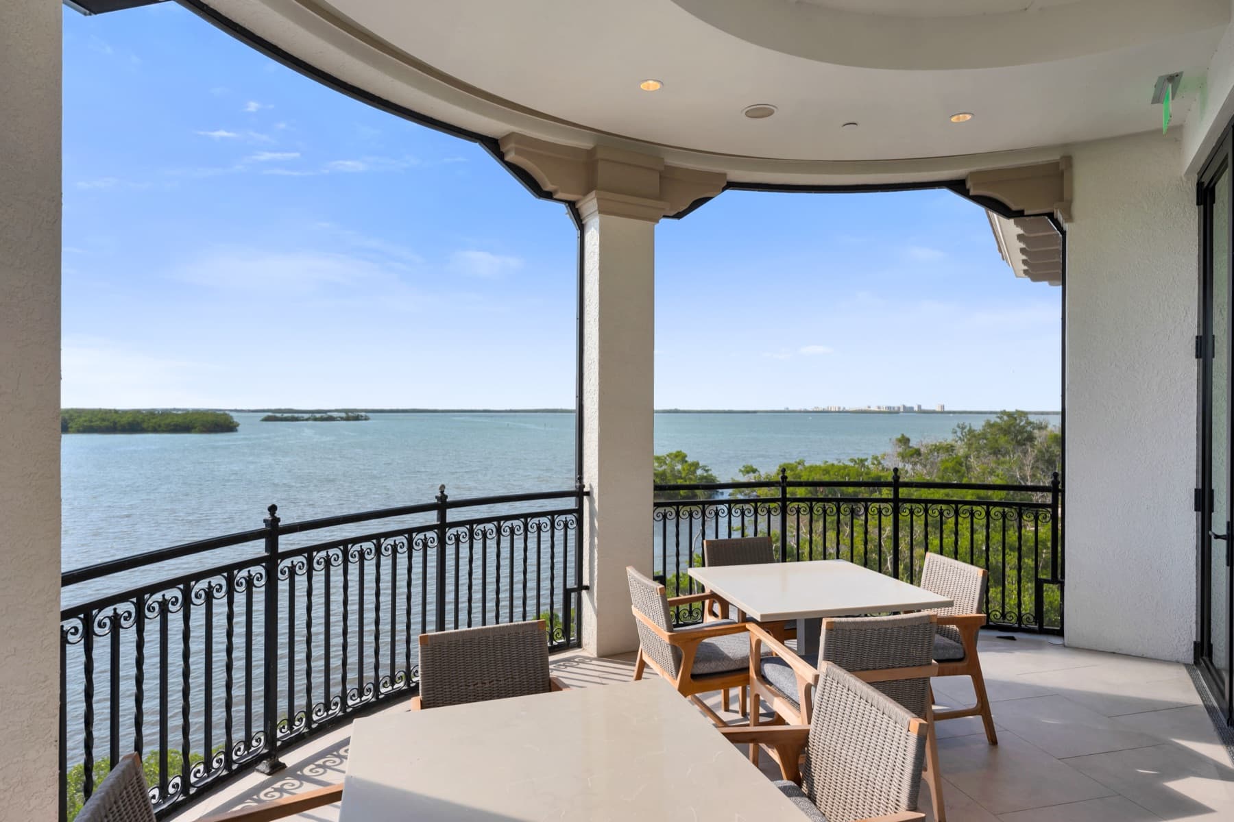 Dining room tables at The Bay Club overlooking Estero Bay